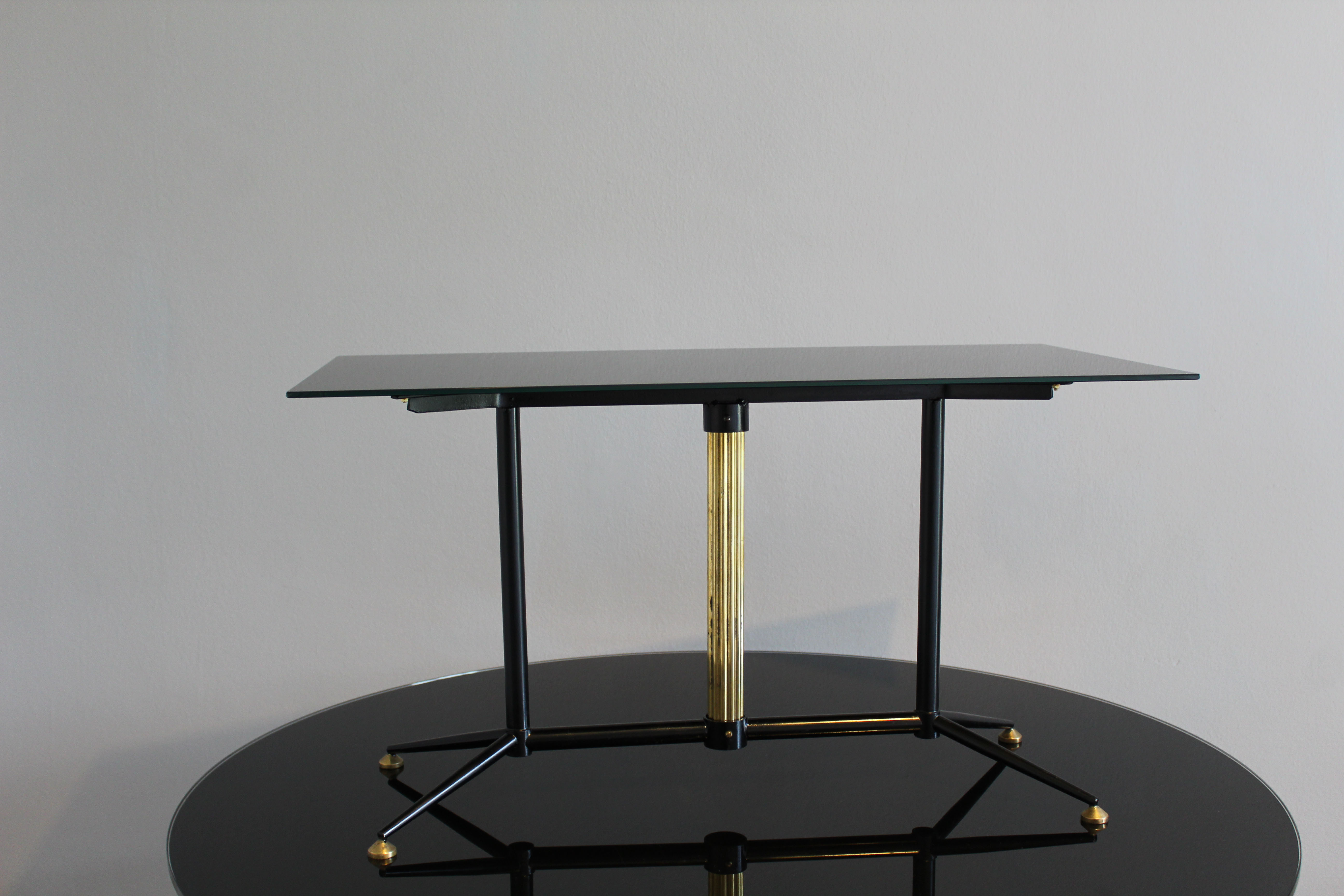 Coffee table in black glass lacquered brass and iron, Italy 50s