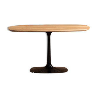 Coffee table in squircle format solid walnut top with a central metal leg