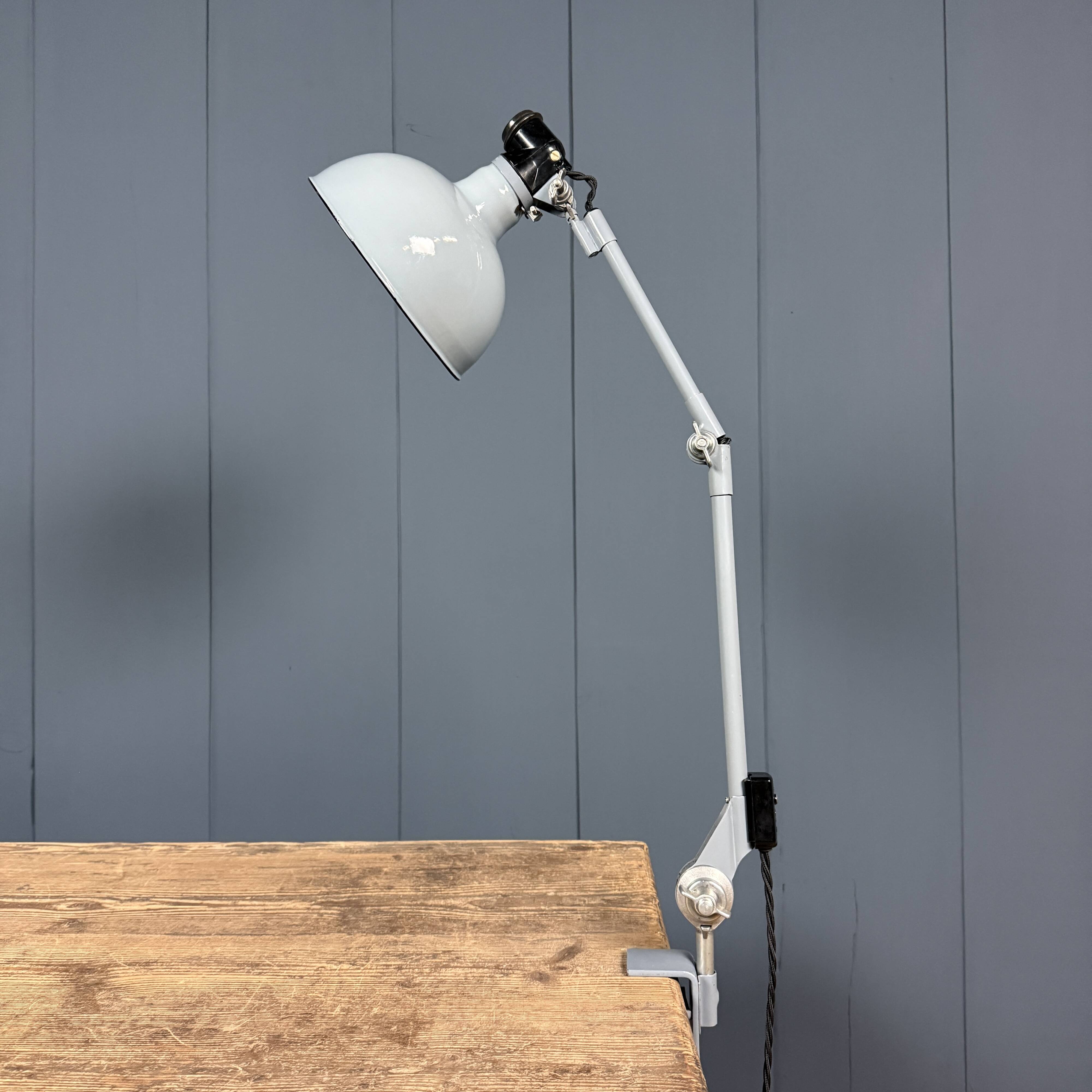 Light grey Rademacher clamp lamp with large enamel shade