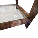 Table basse années 80 en métal gainé imitation loupe de noyer.