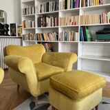 A pair of 1920s armchairs with an ottoman. Good condition.