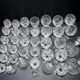 Baccarat set of 35 crystal glasses + 2 flower model carafes 9157 from 1907