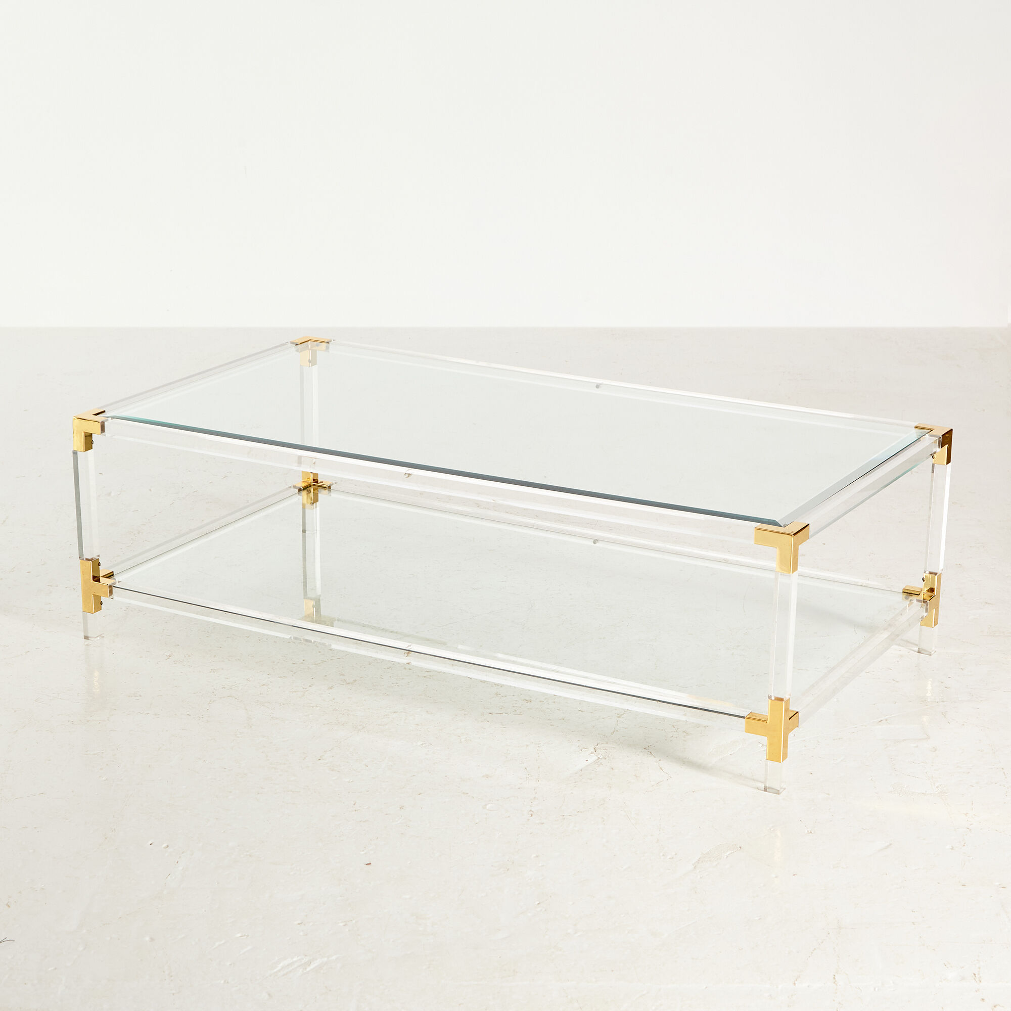 Glass and brass coffee table