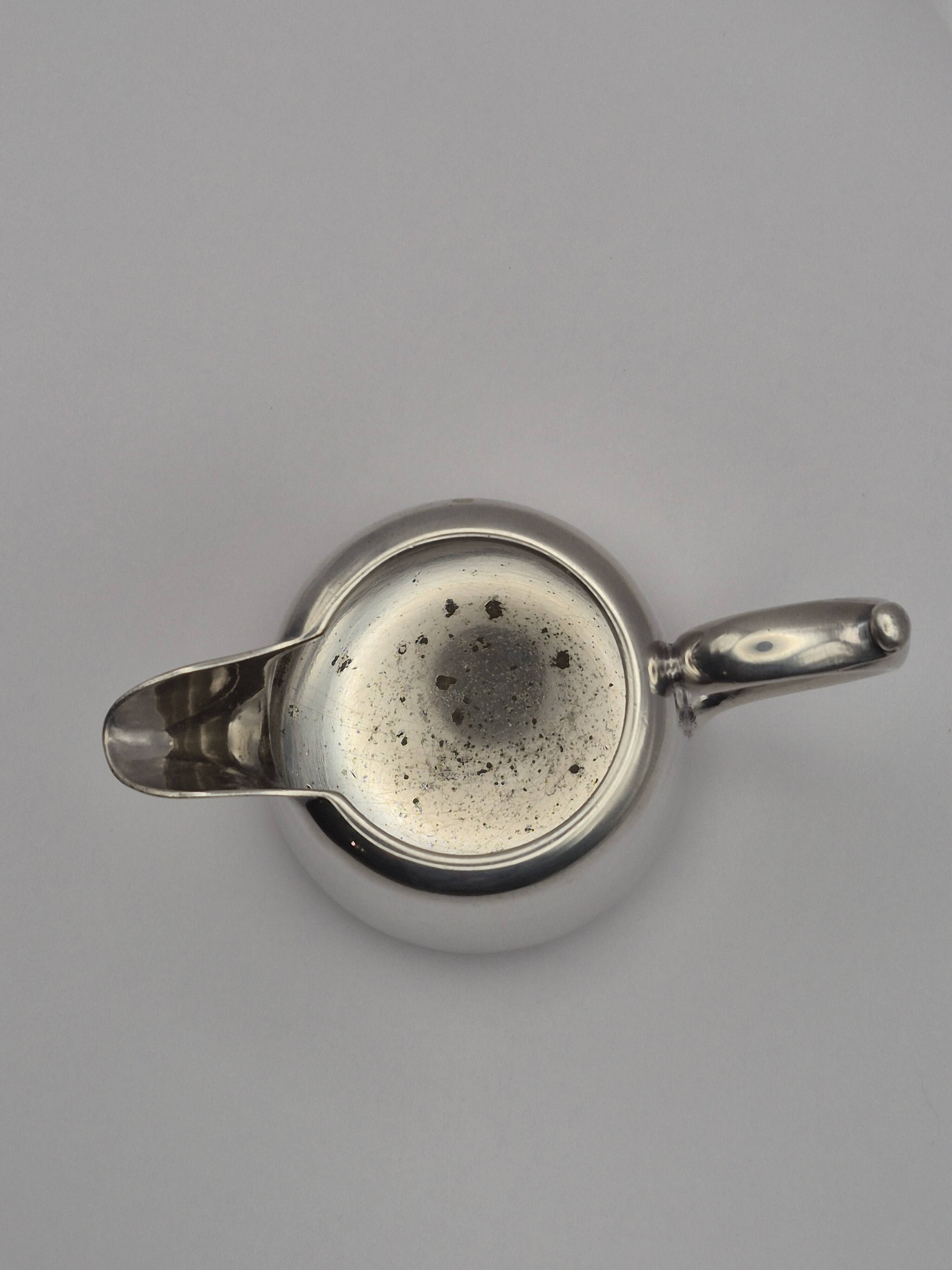 Superb vintage cream jug from the prestigious silversmithing house.