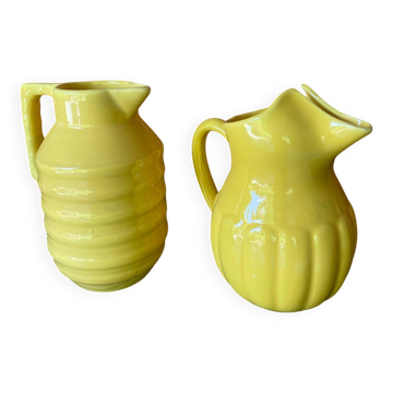 2 old lemon yellow jugs