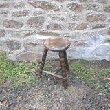 Tripod stool with bossed feet
