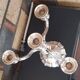 silver candelabrum chandelier with 4 candles