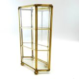 Glass and brass jewelry showcase