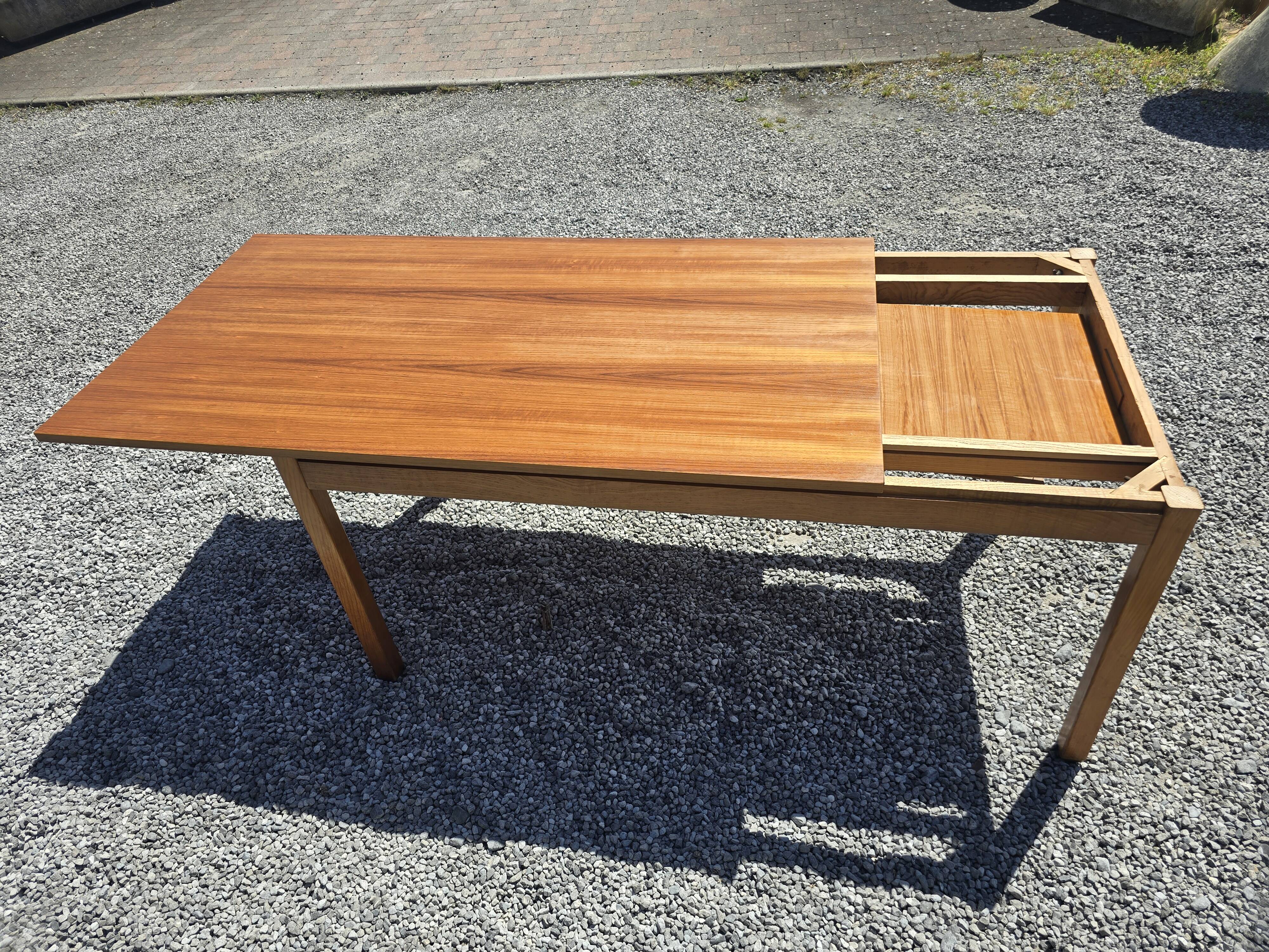 Scandinavian extendable teak table from the 60s