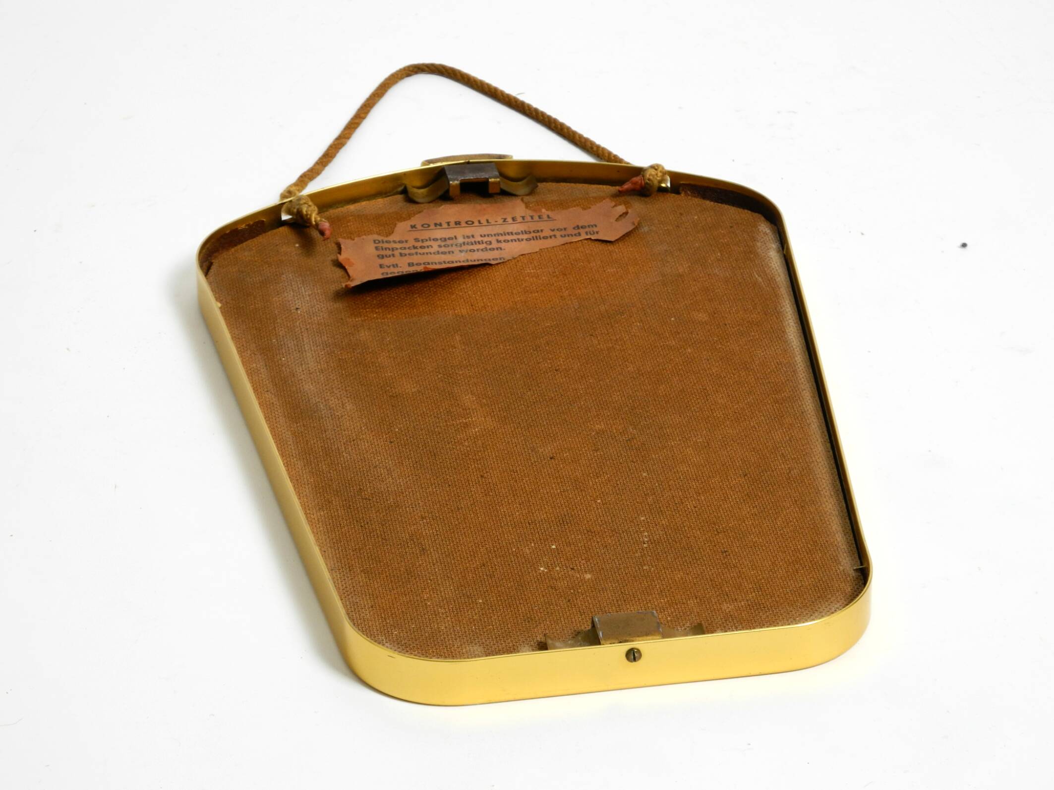 Beautiful small mid-century brass wall mirror with braided hanging strap