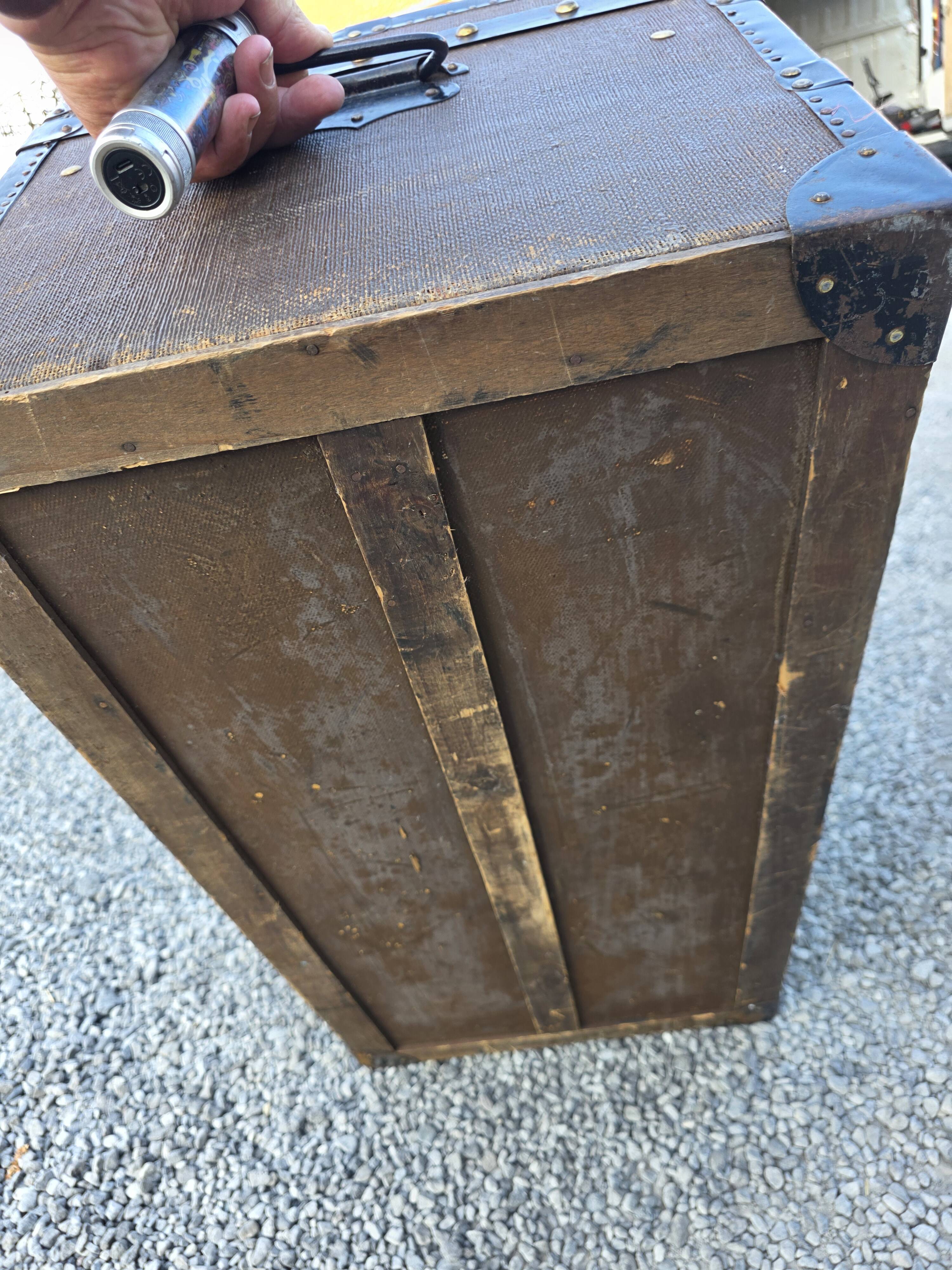Old travel trunk in oilcloth