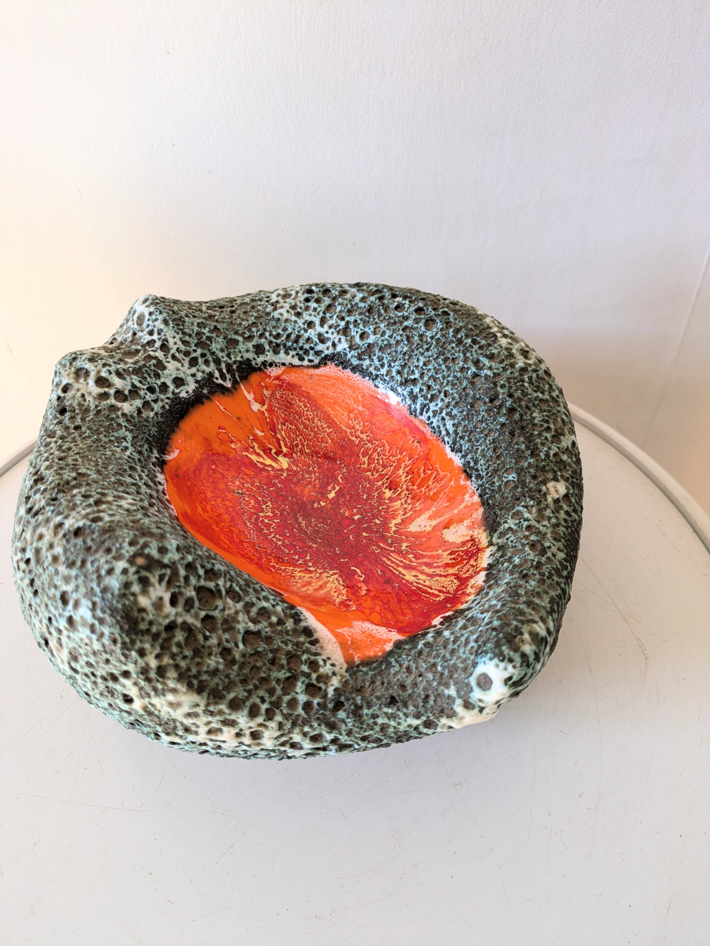 Volcanic lava pocket emptier, 70s design