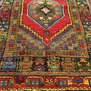 Old Moroccan carpet, made of natural wool and handwoven.