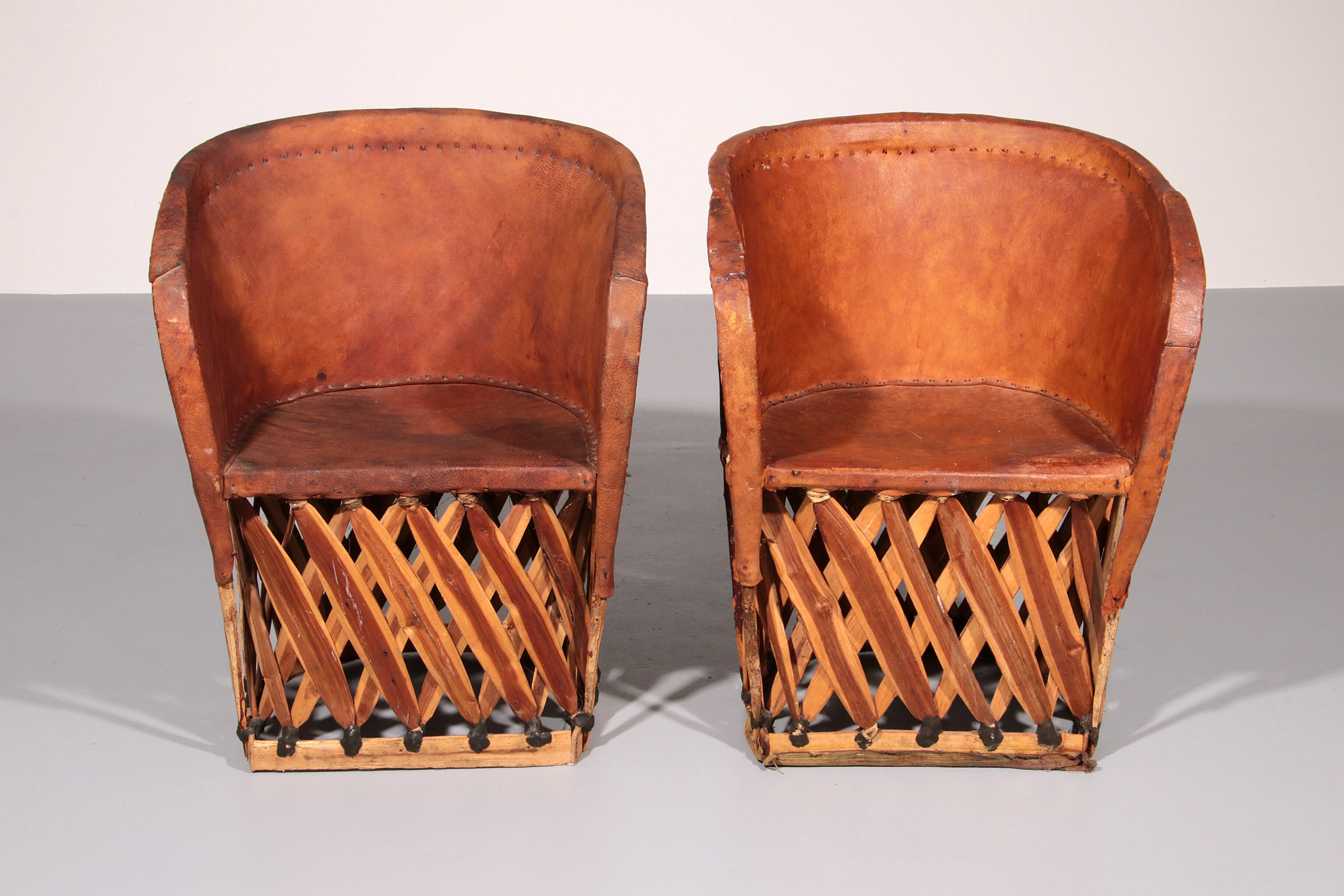 Folk art equipale ostrich chair leather mexico 1970s