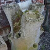 Concrete tree trunk planter