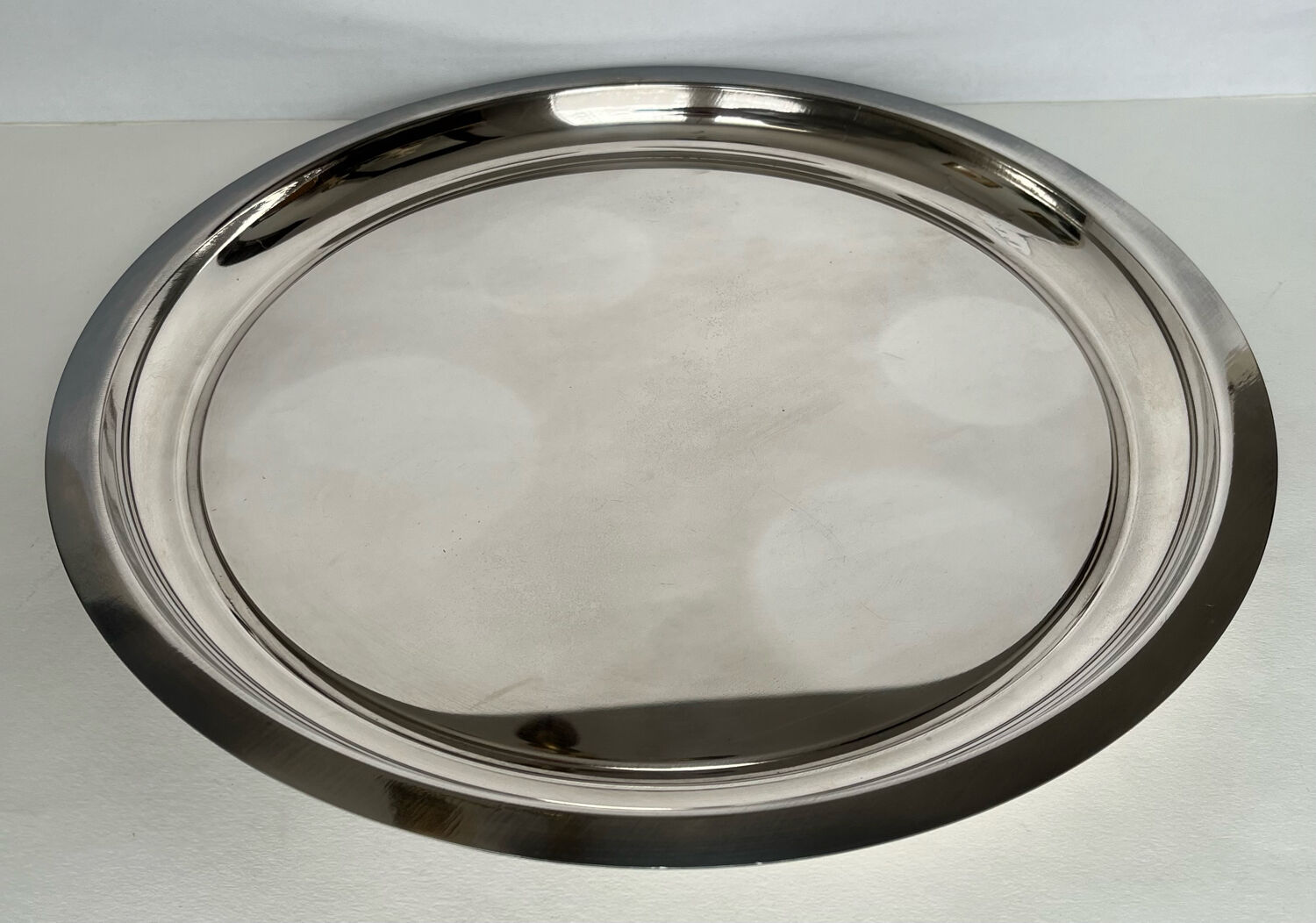 Circular silver metal tray
