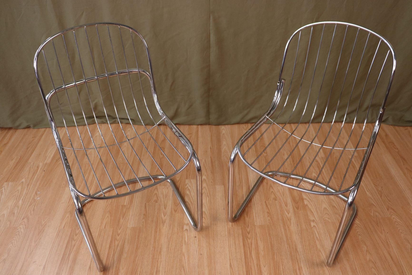 Series of 4 tubular steel chairs
