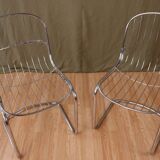 Series of 4 tubular steel chairs
