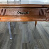 Old table in varnished solid wood