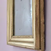 Small Art Deco mirror with a gilded wooden frame.