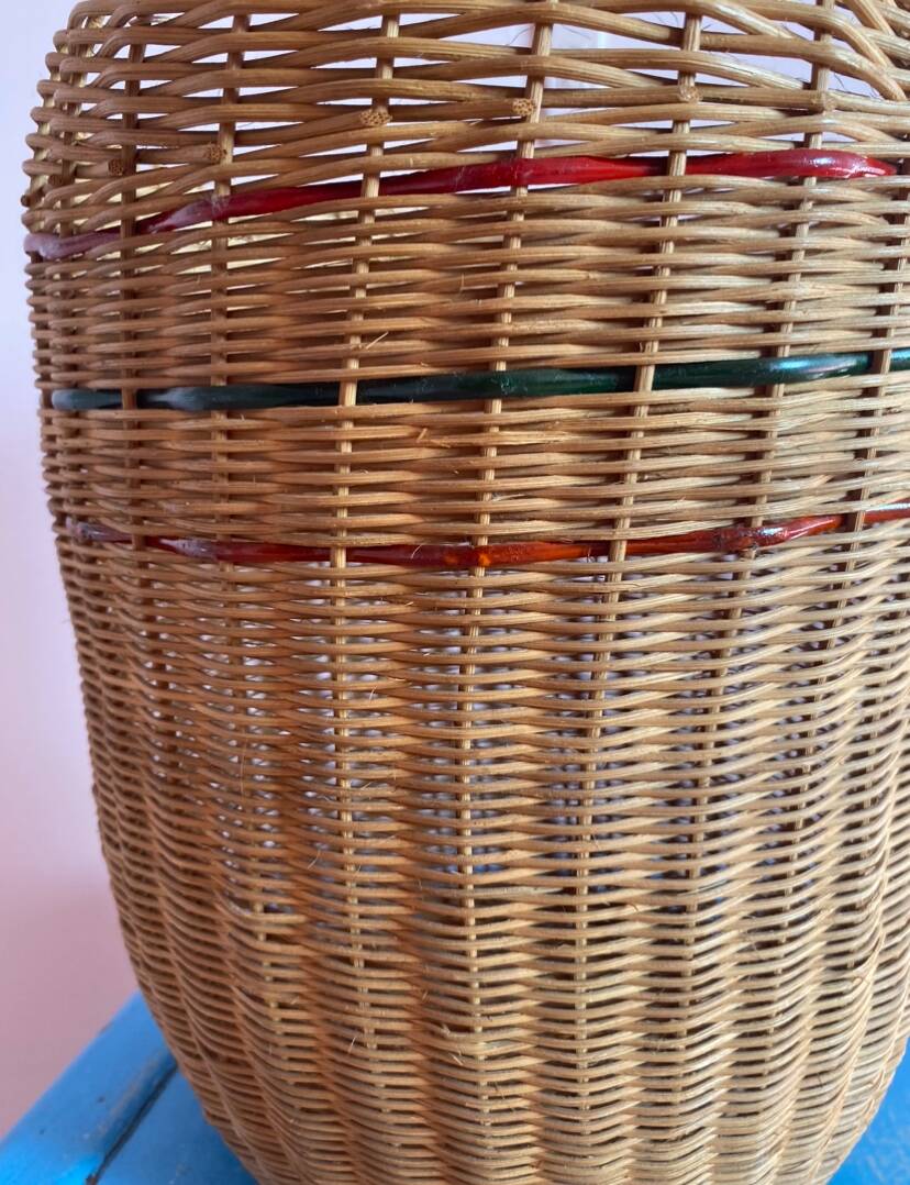 High basket with woven straws