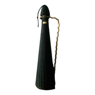 Vintage black and brass scoubidou bottle