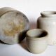 Set of three pots with old condiments in glazed earth