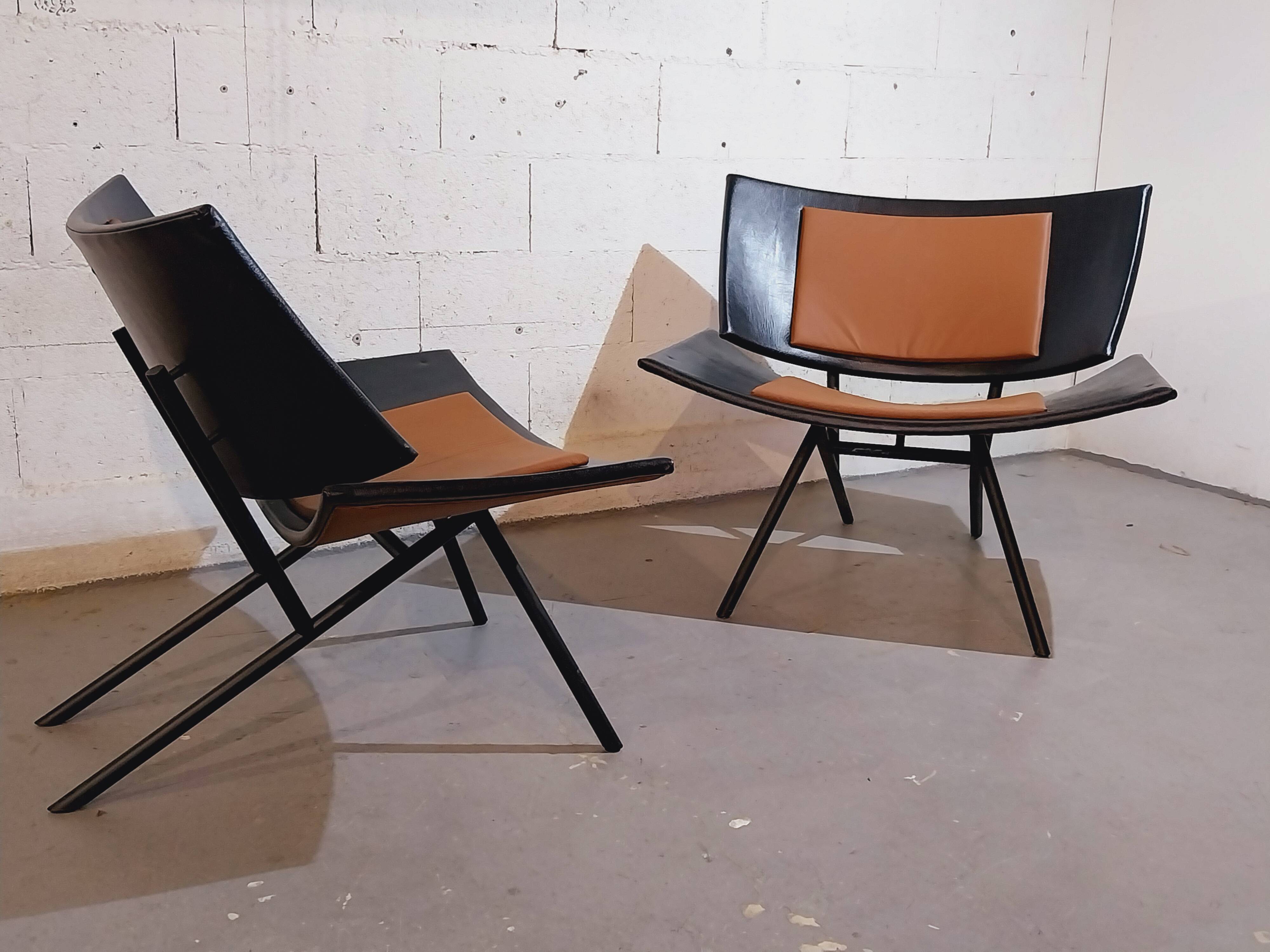 Pair of large airplane wing armchairs 1980