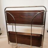 Rolling dessert, trolley says 'dinett'