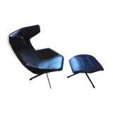 Arrow swivel armchair and foot rests by Alfredo Haberli for Moroso