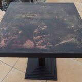 Vintage professional bistro table and its cast iron base