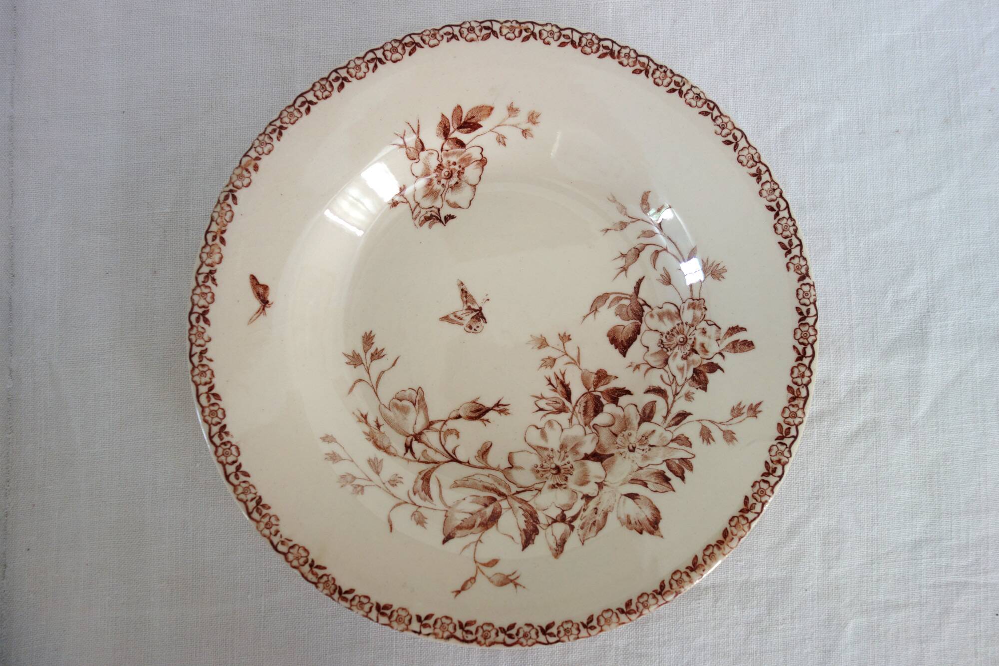 11 deep plates Terre De Fer Gien model Mai circa 1900