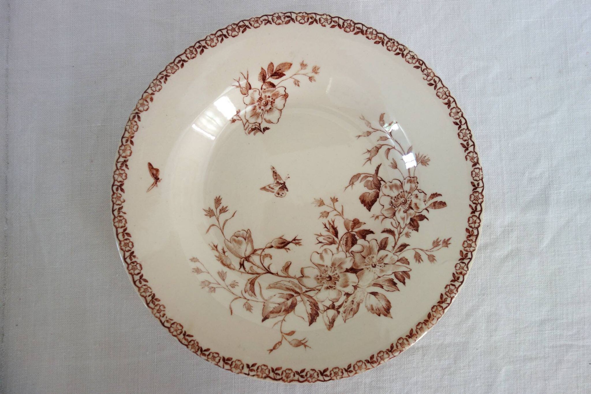 11 deep plates Terre De Fer Gien model Mai circa 1900