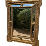 Louis XVI style mirror with glazing beads in gilded wood - 19th century