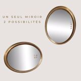 Large and elegant oval gilded mirror with its beveled glass
