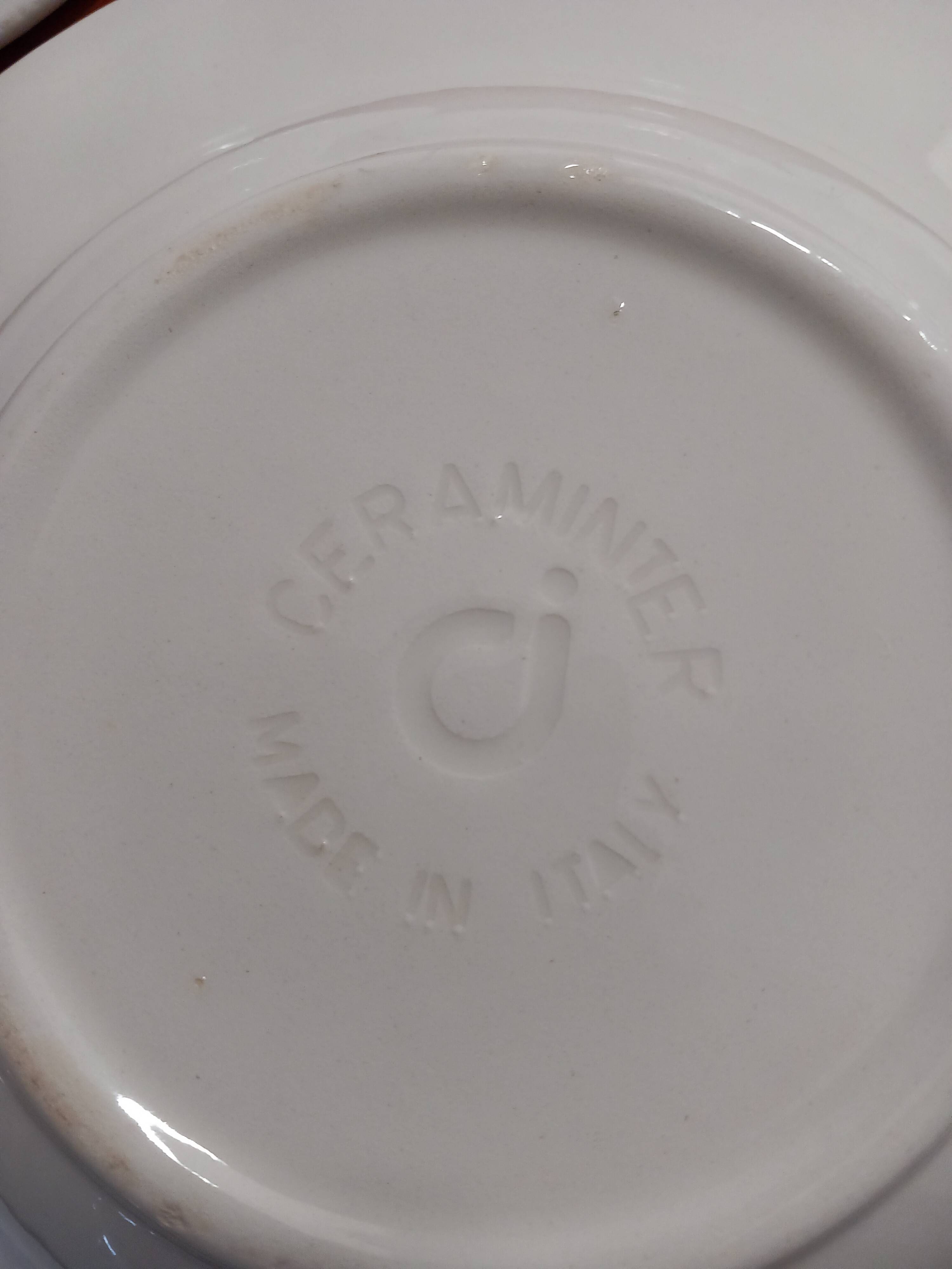Set of 6 white ceramic deep plates made in Italy.