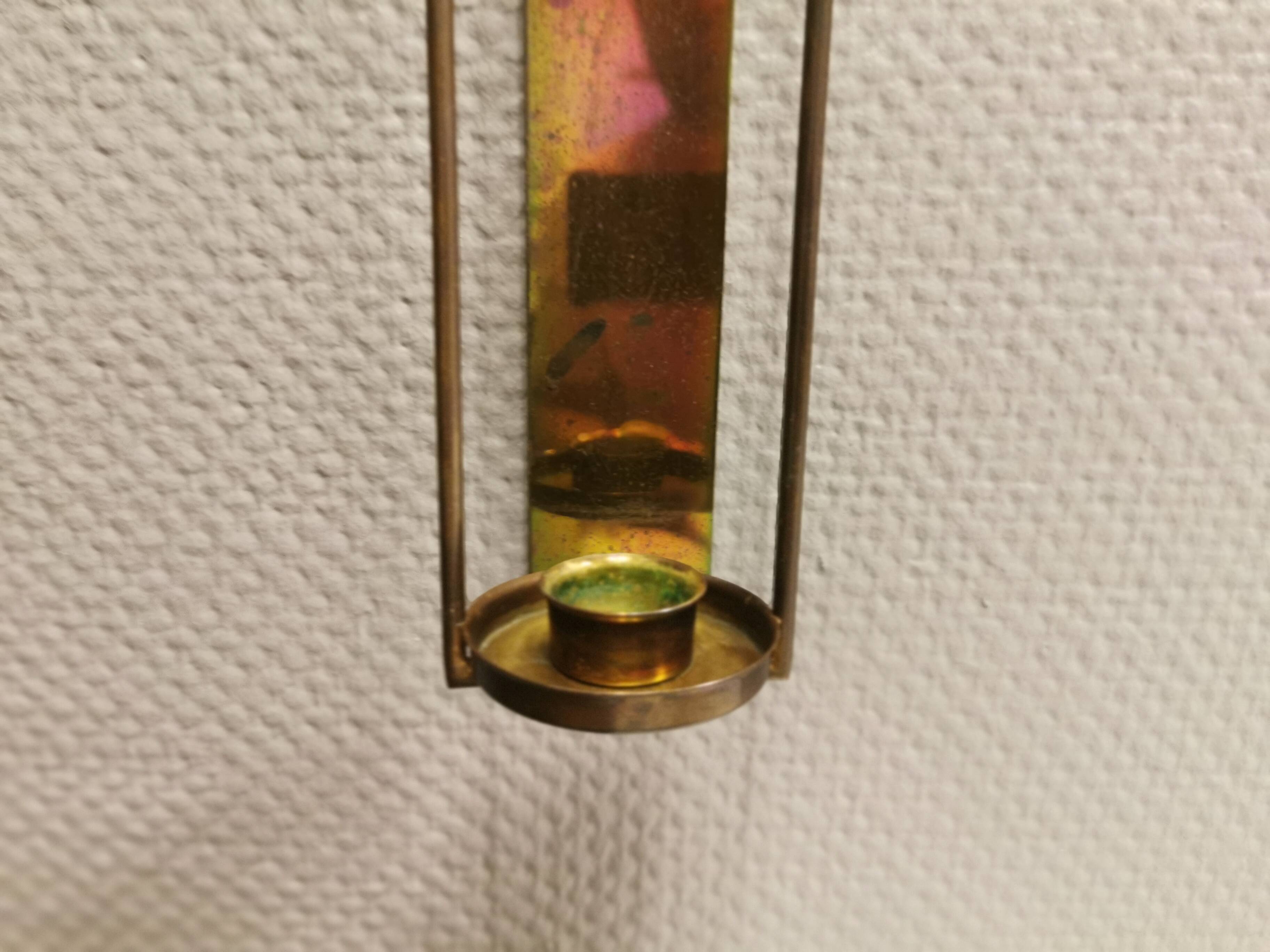 Old Wall hung brass candle holder.