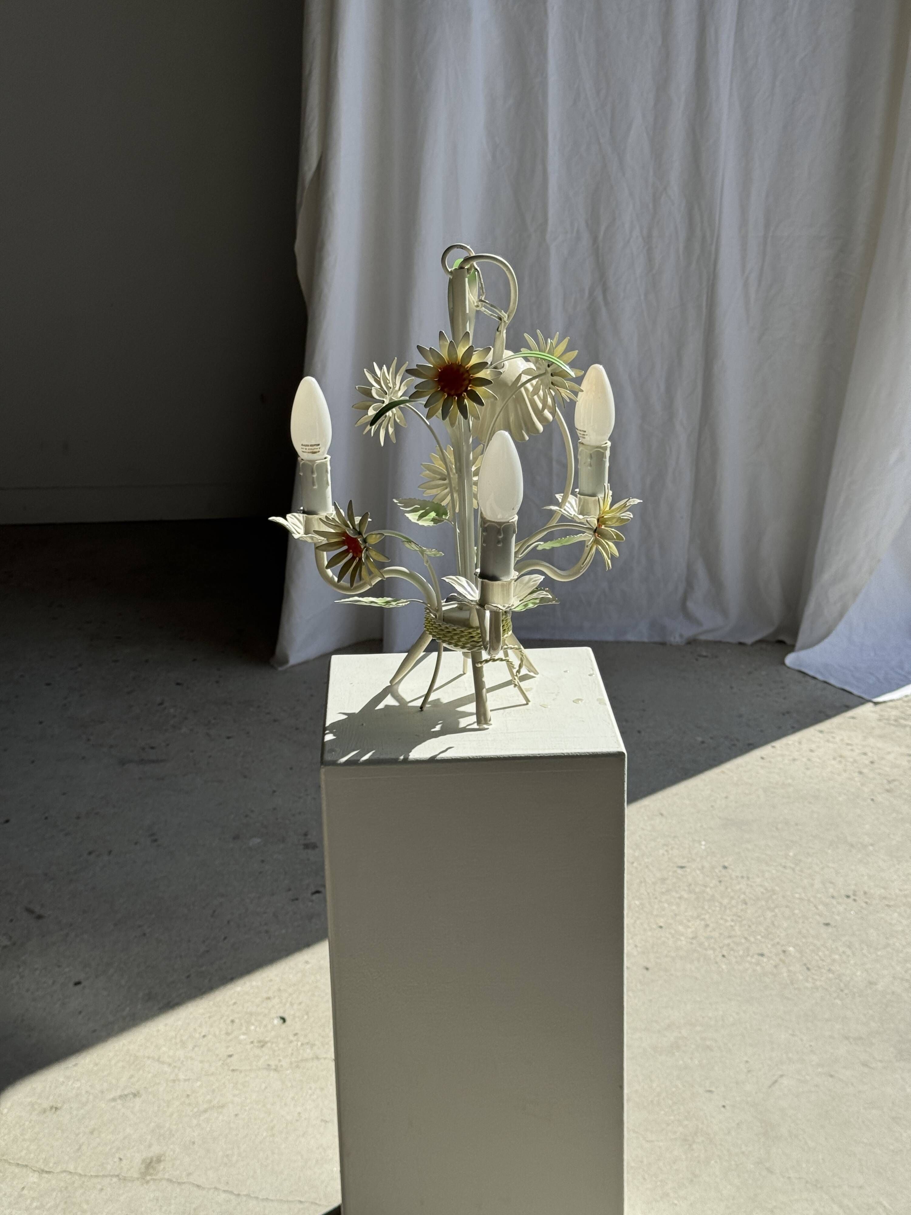 Small vintage cream metal flower chandelier with orange flowers and 3 arms.