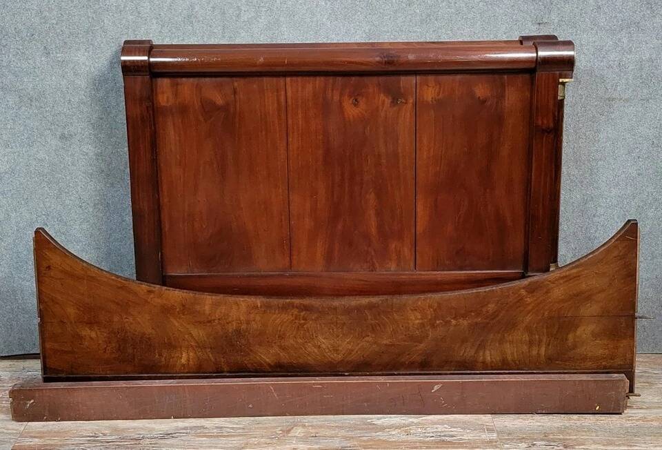 Rare Empire period mahogany bed with gilt bronze profiles circa 1800