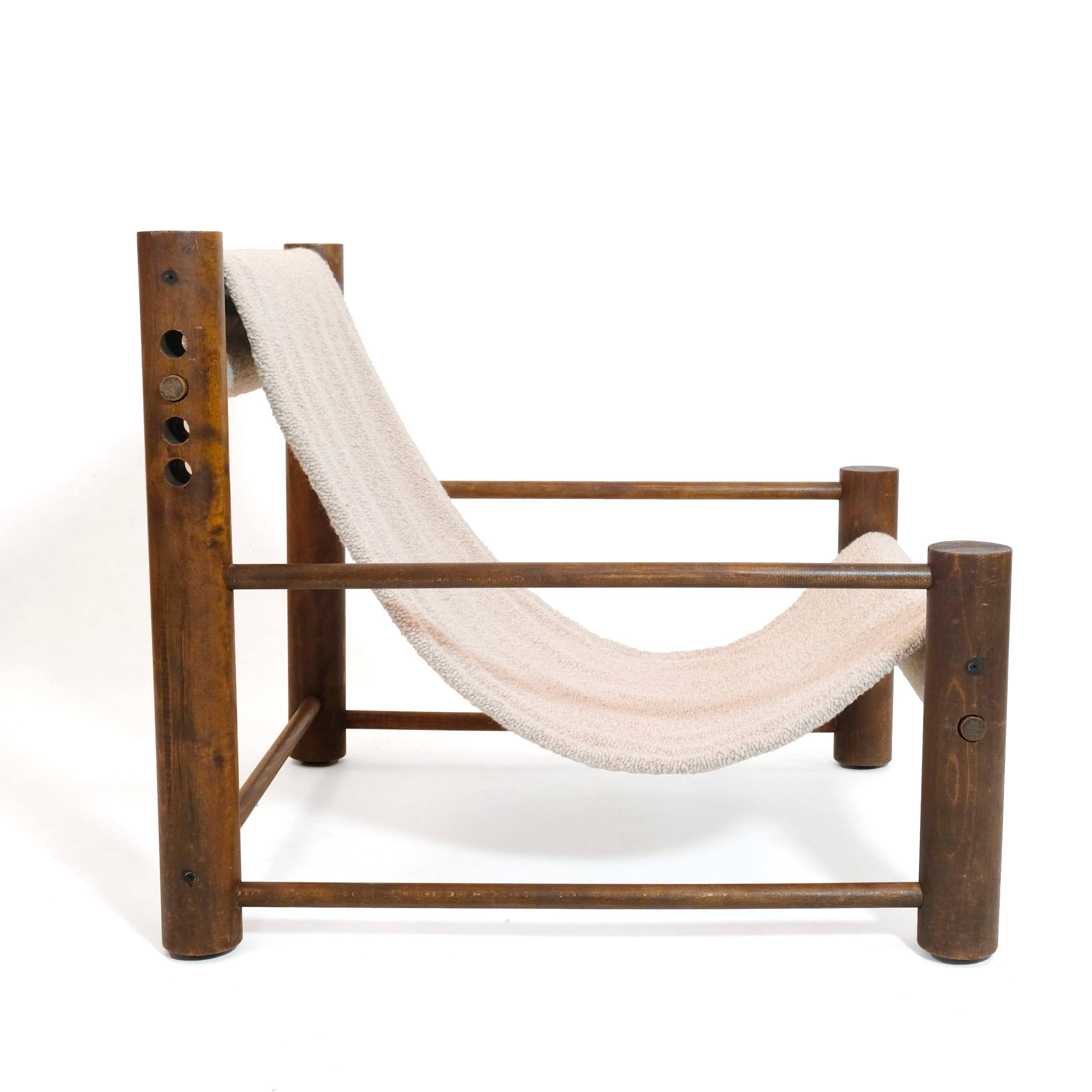 Solid wood armchair with adjustable backrest.