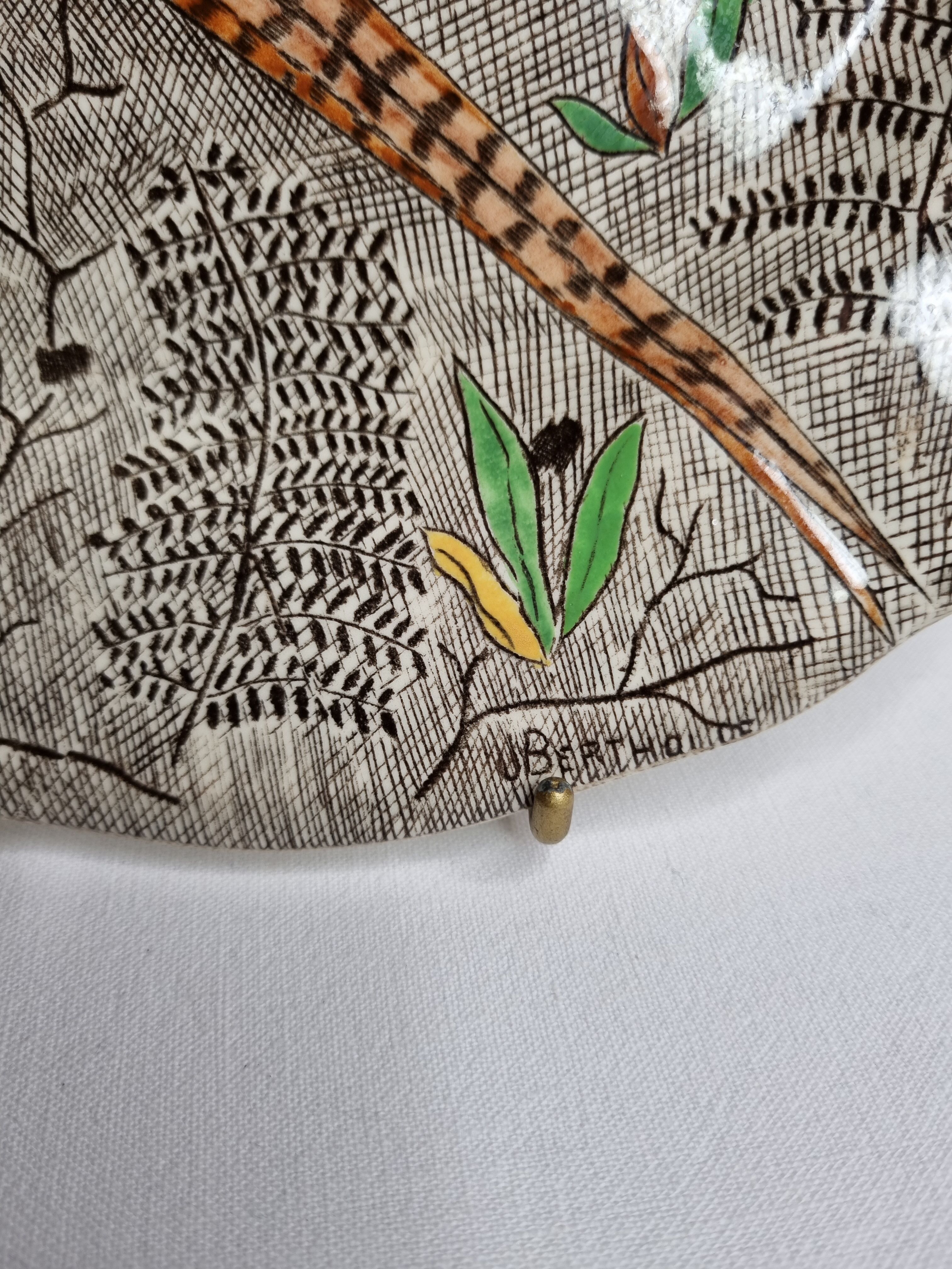 Plate in gien earthenware model rambouillet "couple of pheasants" signed in the décor, 26 cm