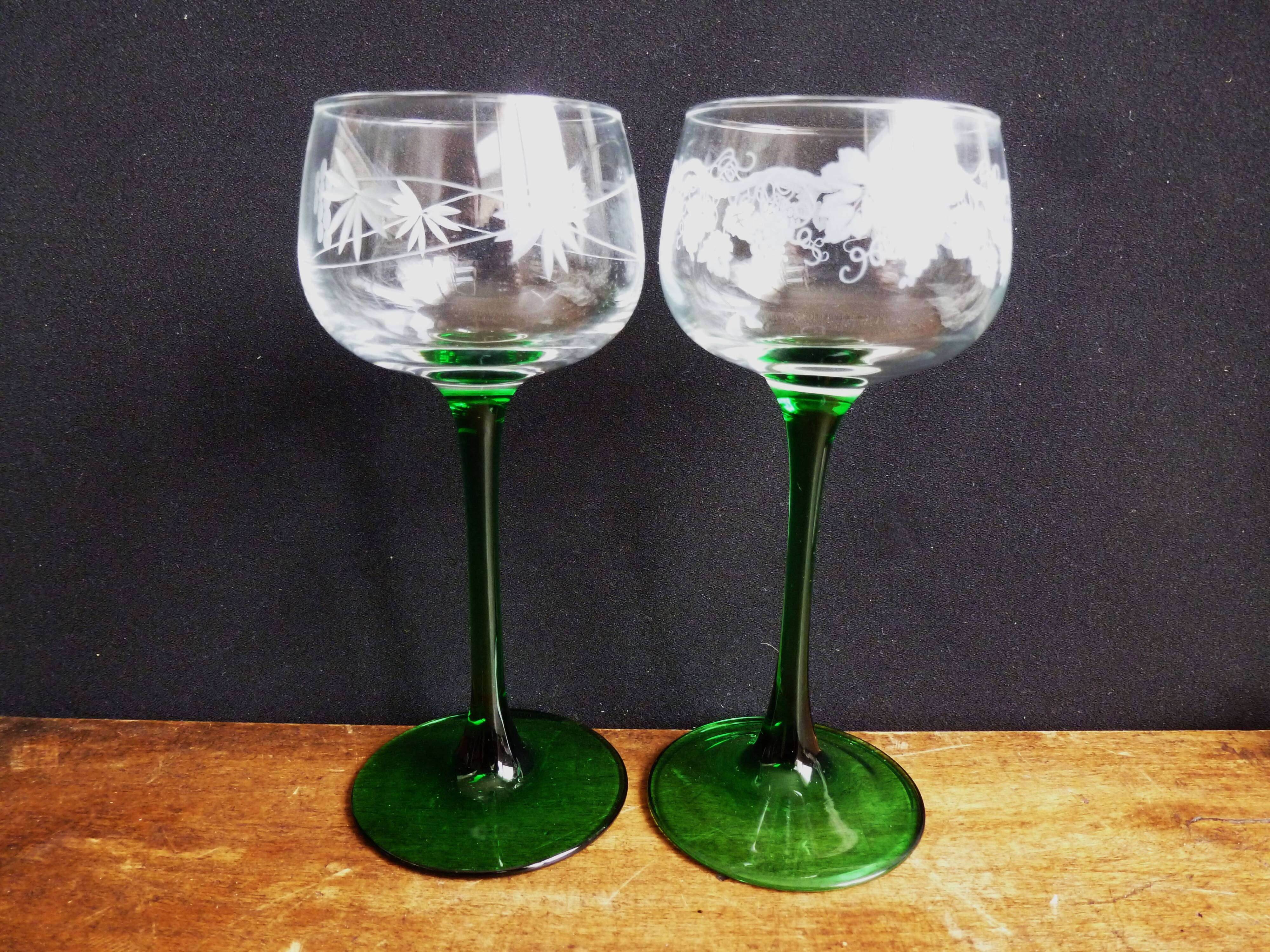 Alsace wine glasses, white wine glasses, green stemmed table glasses.