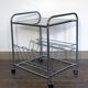 Stainless steel magazine holder side table