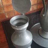 2 pitchers and 1 pewter pitcher