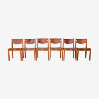 Série de 6 chaises en orme et en cuir par les éditions Maison Regain