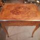 Louis XV style game table in marquetry