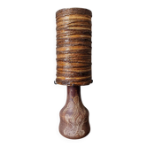Table lamp with terracotta base and resin shade.