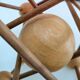 Sculptural modeling of a solid wood atom contemporary design