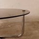 Table basse en verre fumé et métal chromé