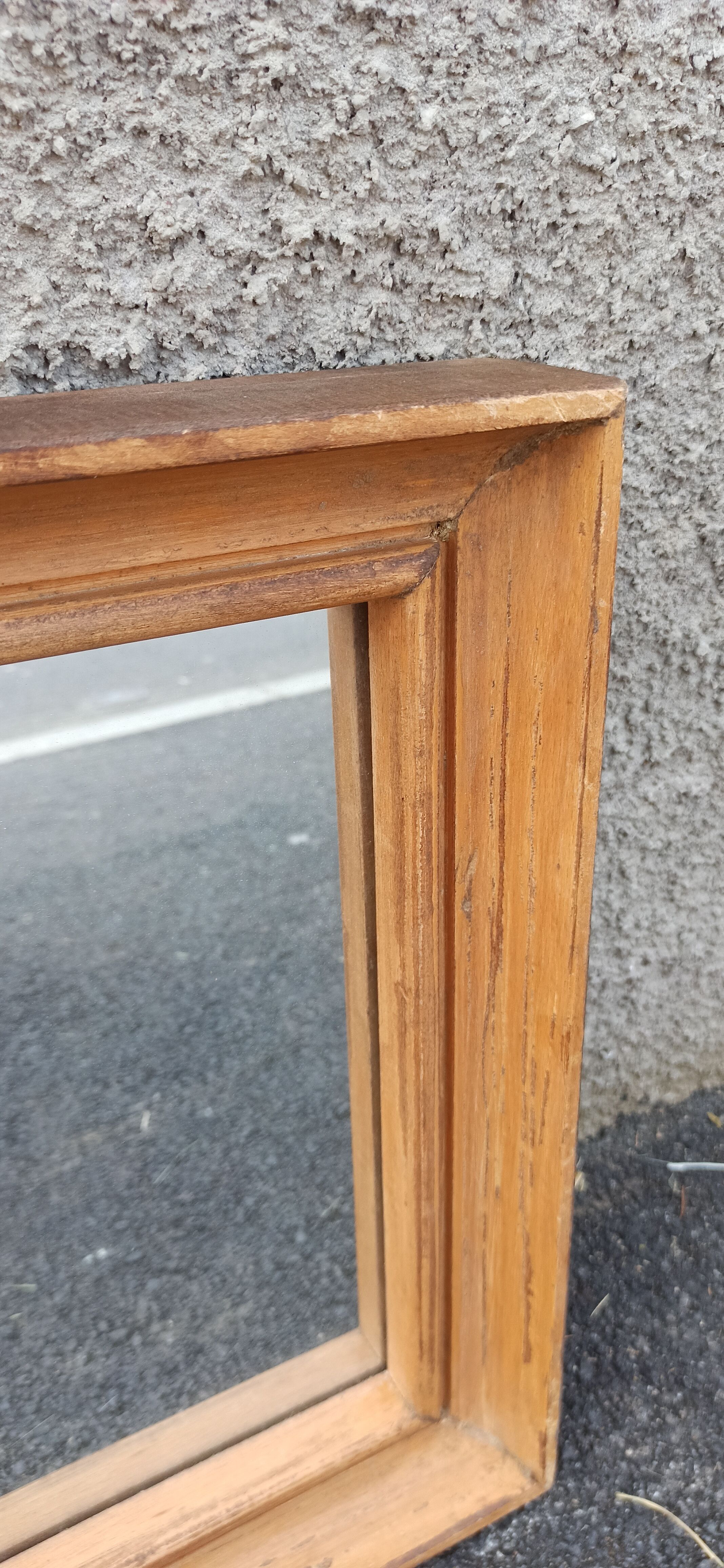 Square mirror in old wood